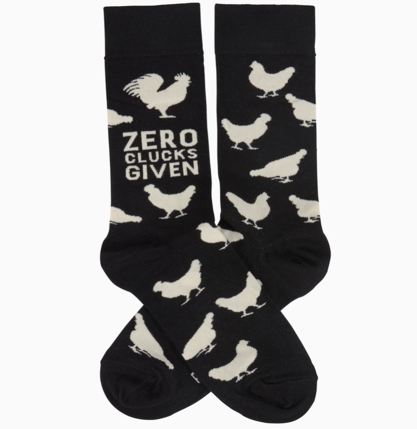 Black socks with white chicken illustrations and 'Zero Clucks Given' text on a white background